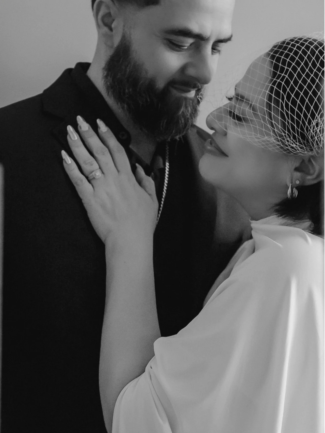 Carmen and Javier together in black and white.